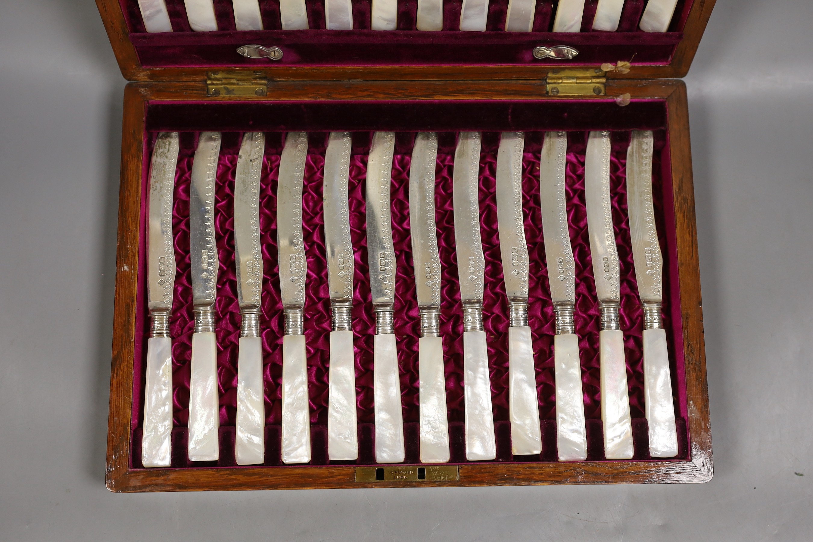 A cased set of late Victorian and later silver and mother of pearl handled dessert eaters, Martin, Hall & Co, Sheffield, 1897/19092/1903